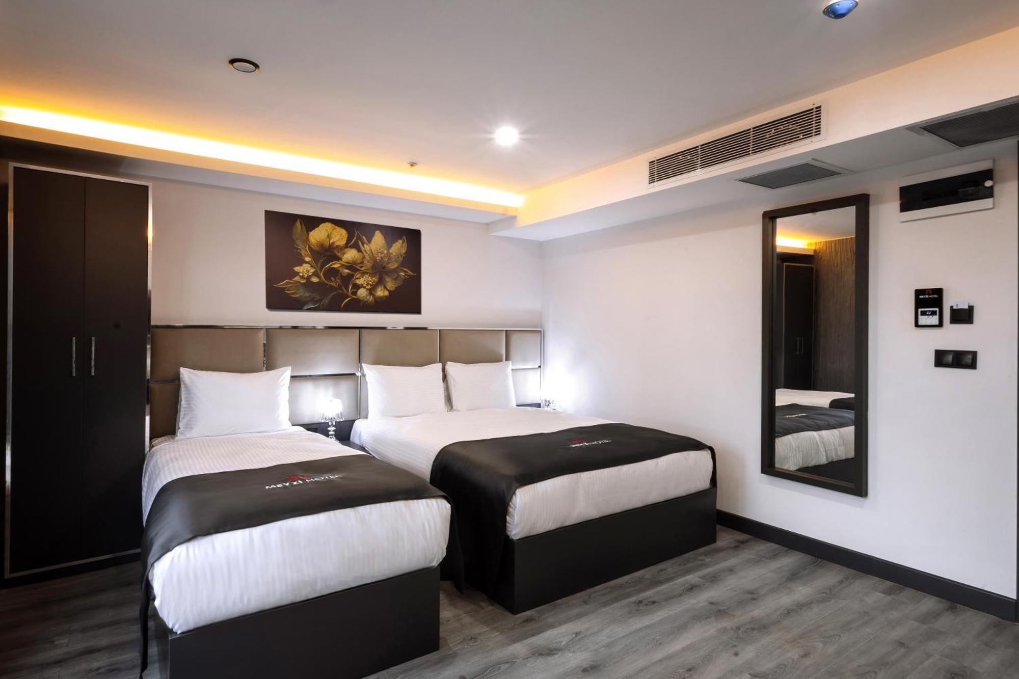 Deluxe Dreibettzimmer